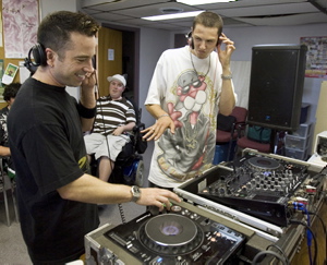 A regular day at the Rhythm program, with pro working DJs working together with youngsters